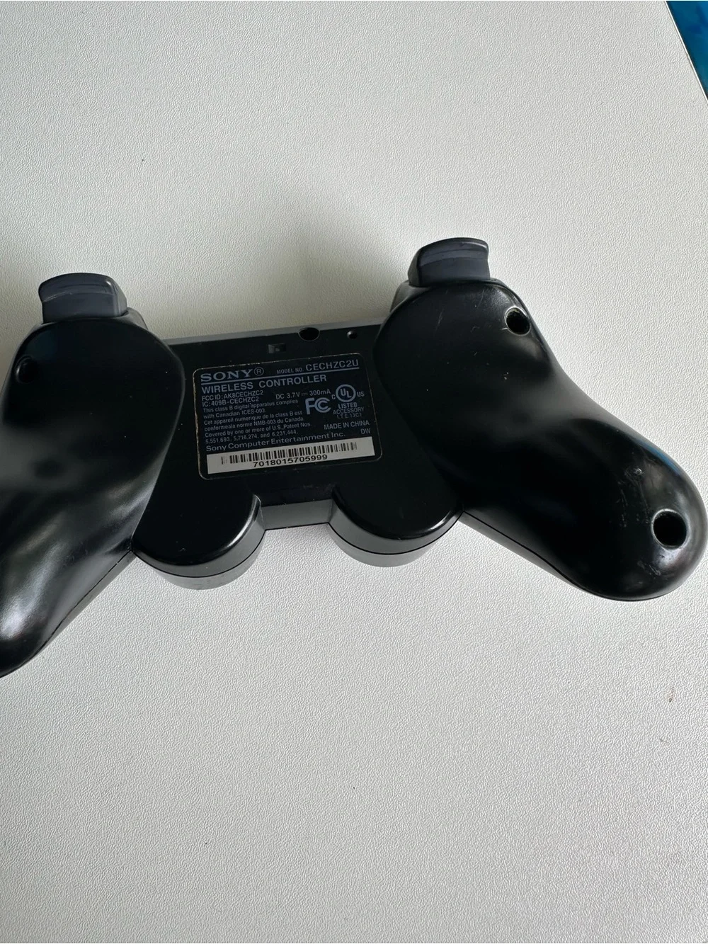Sony Black PlayStation Controller with Colored Face Buttons